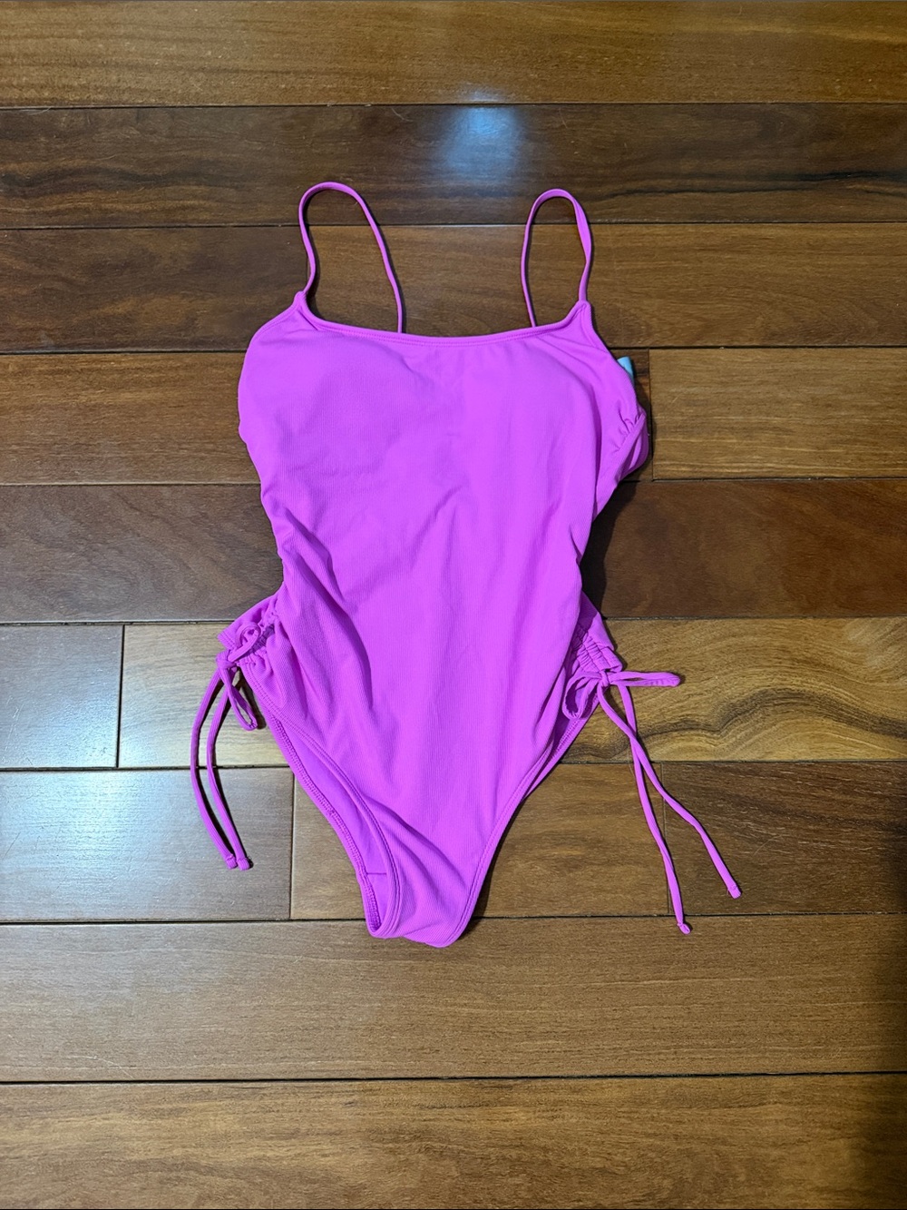 Pink One-Piece Swimsuit with adjustable Side Ties
